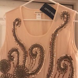 Gold sequined flapper dress with tags.